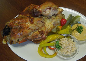 Hostinec Staré Časy - Ostrov u Macochy - Pork knuckle baked with garlic, served with mustard, horseradish and pickled vegetables. 